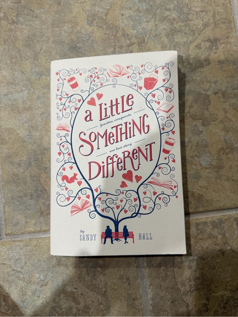 A Little Something Different Paperback Book - Cream with Red & Navy Cover